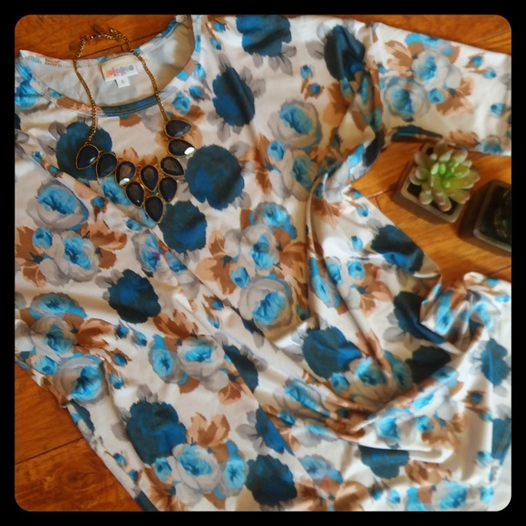 LuLaRoe Tops - NWT Slinky Blue & White Floral Irma Small